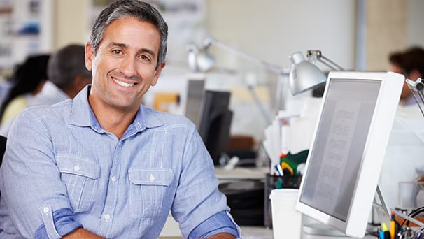 Marketing expert in front of his computer