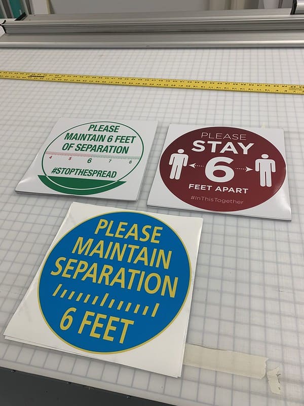 3 different type of stickers for people spacing