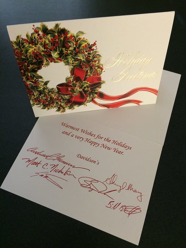 A custom personalized christmas card from a office