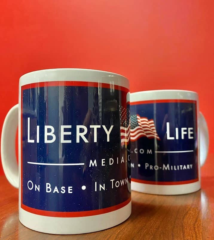 A pair of mug with a specialized promotional message on them